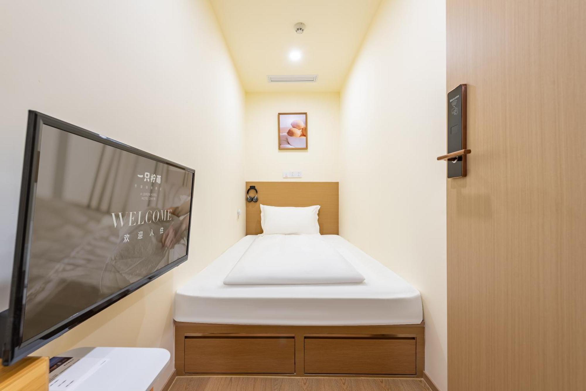 Lemon Hotel - Metro Line 1 Line 7 Changshu Road 200 Meters เซี่ยงไฮ้ ภายนอก รูปภาพ